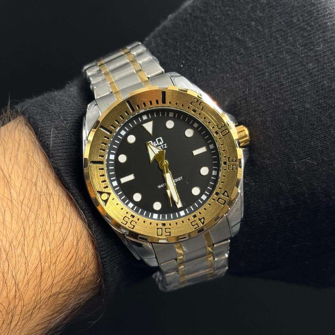 Reloj Bicolor Dorado/Plateado con Esfera Negro/Dorado QYQ Bazel Hombre | Luxury Ejecutivo de Alto Impacto