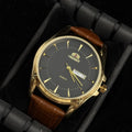 Reloj Cuero Café con Esfera Negra y Detalles Dorados | Estilo Luxury Clásico