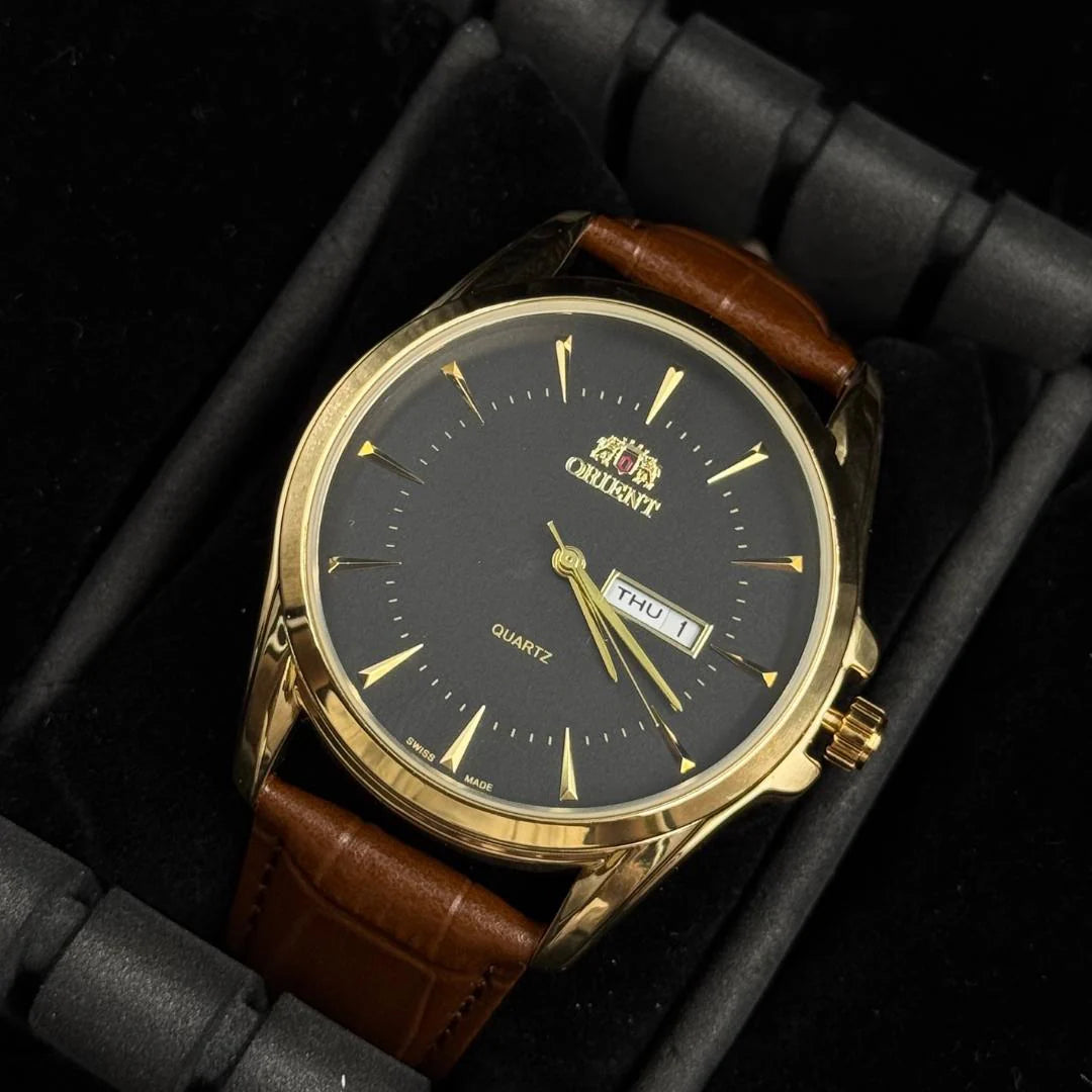 Reloj Cuero Café con Esfera Negra y Detalles Dorados | Estilo Luxury Clásico