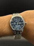 Reloj Plateado con Calendario y Esfera Azul | Estilo Luxury Clásico Moderno