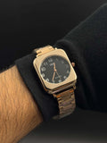 Reloj Cuadrado Oro Rosa con Esfera Negra QYQ NM | Luxury Moderno