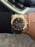 Reloj Metálico Bicolor Dorado Tchmrn | Luxury Elegante con Esfera Negra y Acabado Premium