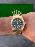 Reloj Dorado con Esfera Negra | Estilo Clásico Elegante Premium